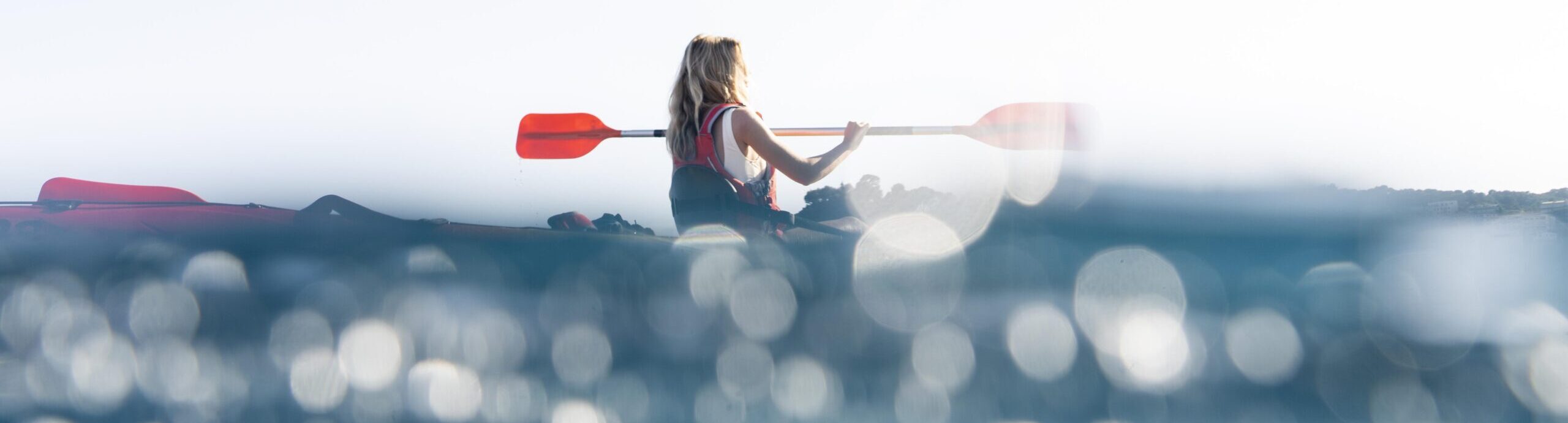 young-beautiful-woman-traveling-by-canoe (1)